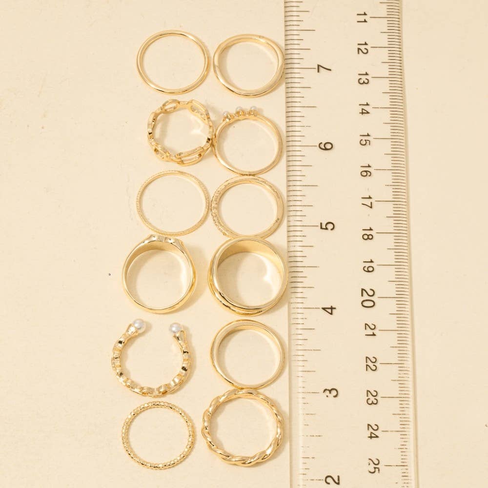 Twelve Piece Assorted Mother Of Pearl Heart Ring Set