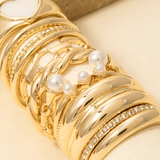 Twelve Piece Assorted Mother Of Pearl Heart Ring Set