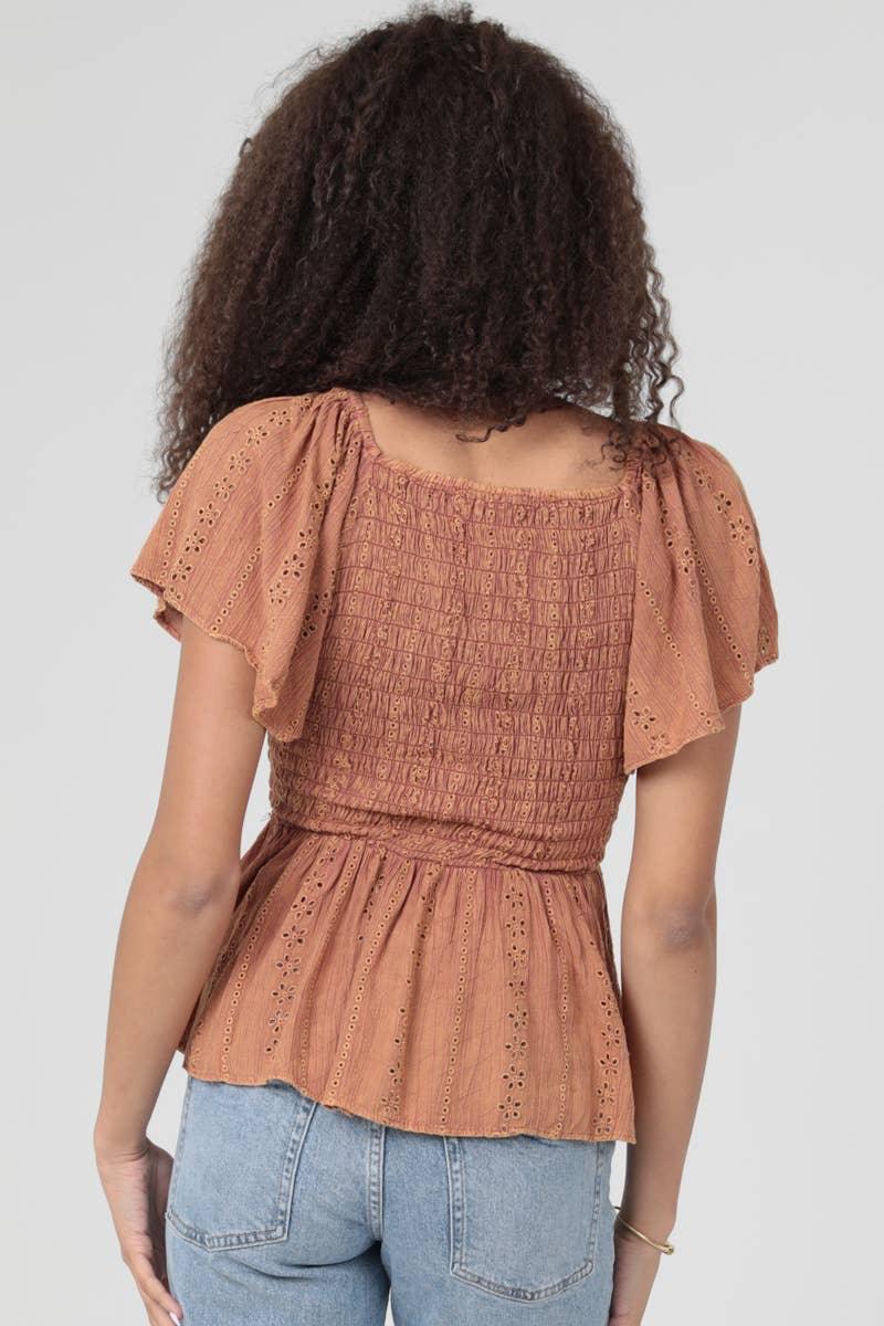 EYELET EMBROIDERY ACID WASH V NECK SMOCKED TOP - Southern Sassy Boutique