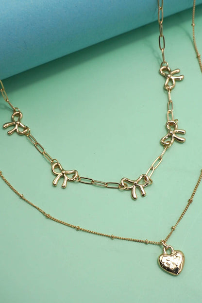 DOUBLE LAYER MULTI BOW WITH HEART CHARM NECKLACE | 80N91660