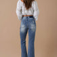 High Rise Front Slit Flare Distressed Denim