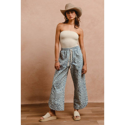 WASHED LEOPARD PATTERN CURVED SIDE SEAM PANTS