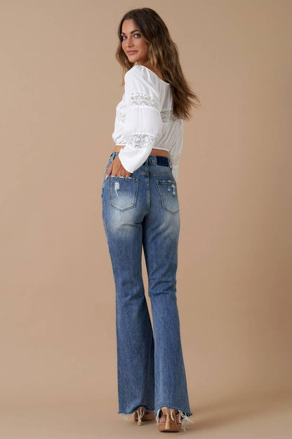 High Rise Front Slit Flare Distressed Denim - Southern Sassy Boutique