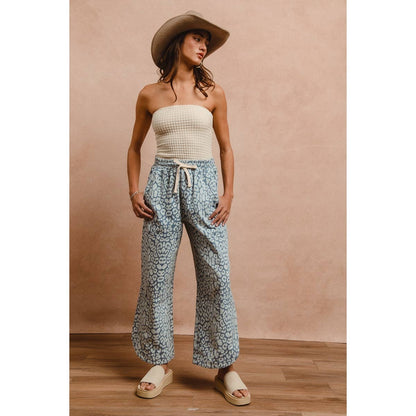 WASHED LEOPARD PATTERN CURVED SIDE SEAM PANTS