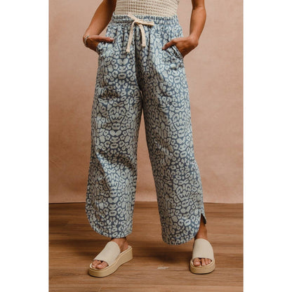 WASHED LEOPARD PATTERN CURVED SIDE SEAM PANTS