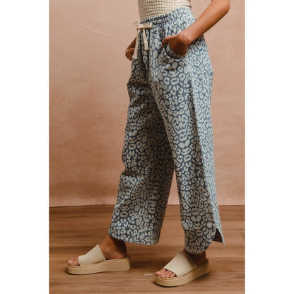 WASHED LEOPARD PATTERN CURVED SIDE SEAM PANTS