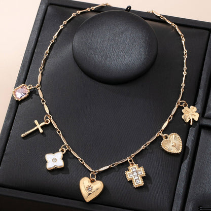 Charm Necklace with crosses hearts flowers clovers