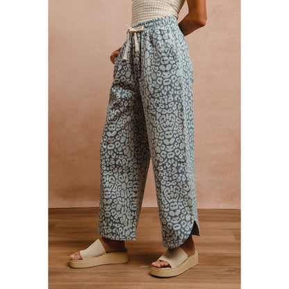 WASHED LEOPARD PATTERN CURVED SIDE SEAM PANTS