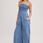 DENIM SMOCKED STRAP WIDE LEG JUMPSUIT