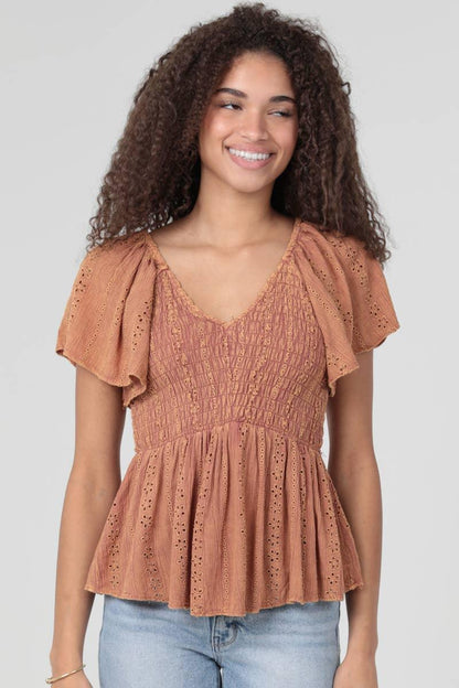 EYELET EMBROIDERY ACID WASH V NECK SMOCKED TOP - Southern Sassy Boutique