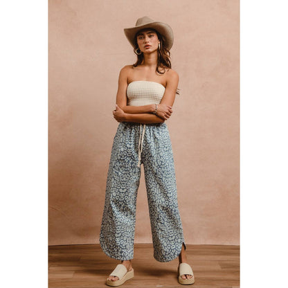 WASHED LEOPARD PATTERN CURVED SIDE SEAM PANTS