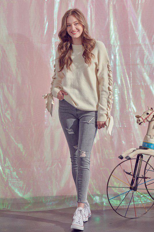 Image: Long Sleeve Sweater with Bow Tie Ivory | Southern Sassy Boutique