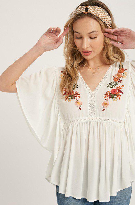 Image: Short Sleeve Blouse - Woven peasant top featuring a floral embroidery Ivory | Southern Sassy Boutique