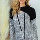 Image: Animal Print Sweatshirt With keyhole Detail  | Southern Sassy Boutique